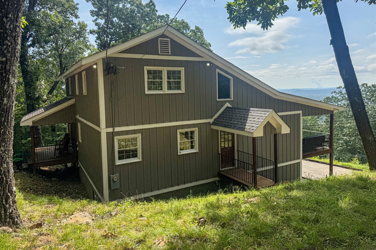 This cozy two-story home offers stunning views while remaining just minutes from town for the perfect blend of privacy and convenience.