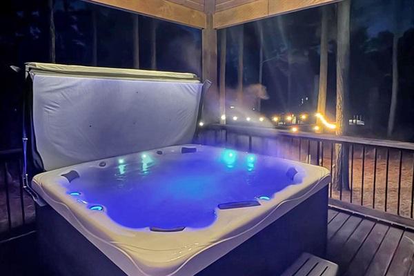 Unwind in the private hot tub, surrounded by the quiet beauty of the forest.