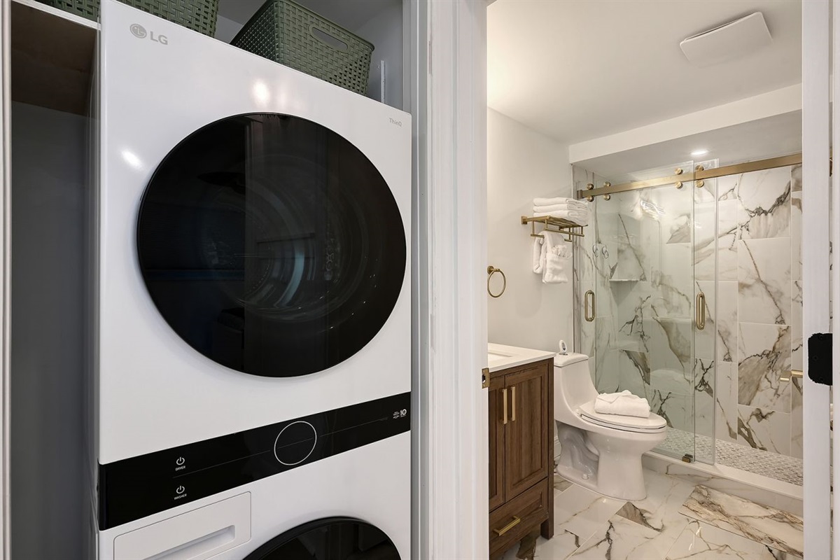 New washer & dryer in hallway