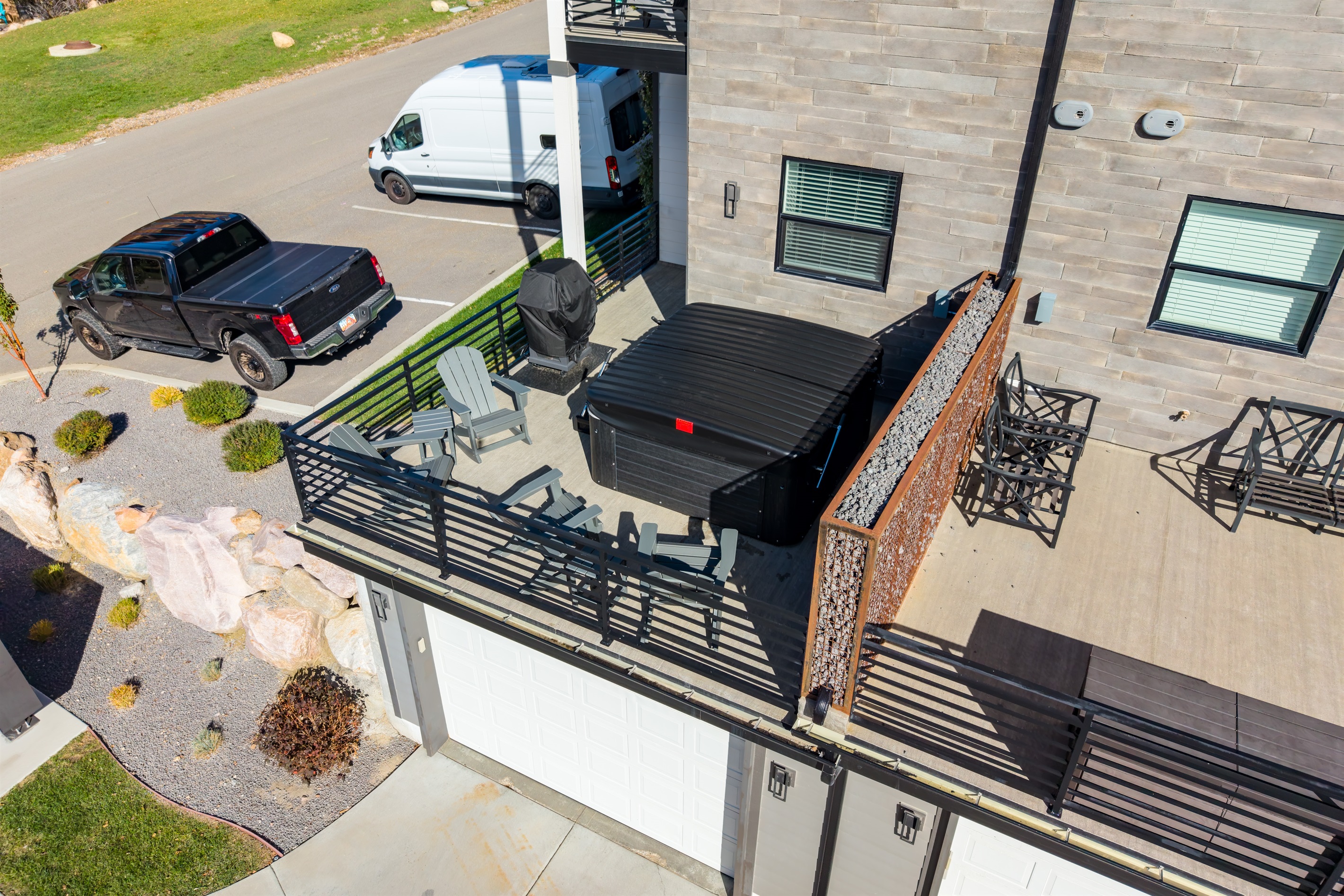 Aerial view highlighting the deck and outdoor amenities.