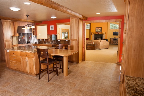 Kitchen, with living room in the background