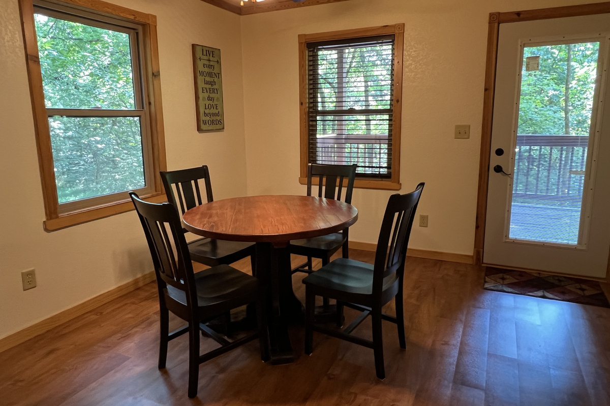 Game table in entertainment area showing lower deck access door