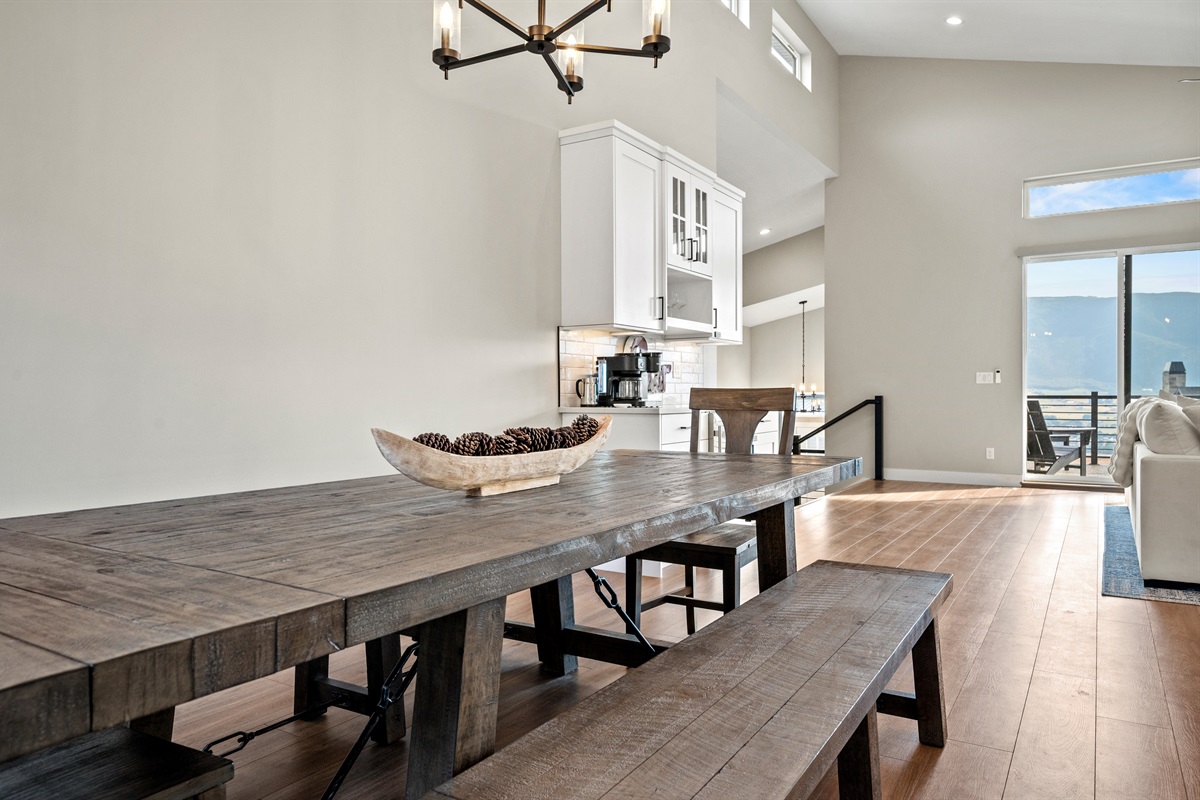 Scenic mountain beauty fills the living and dining areas and extends to the deck.