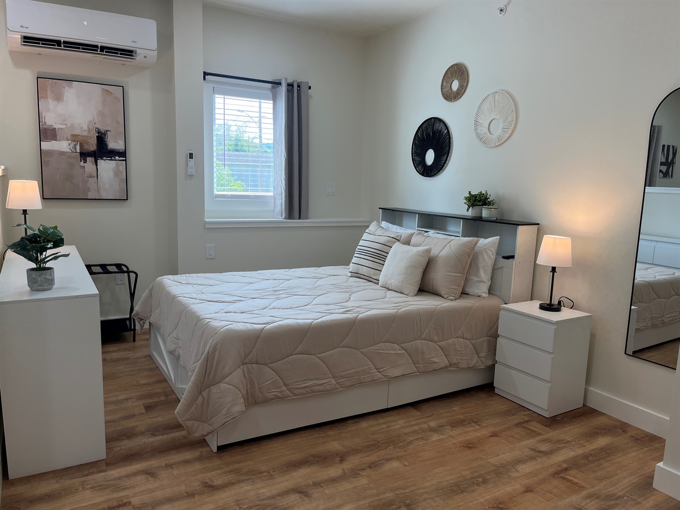 Queen bed in studio sleeping area