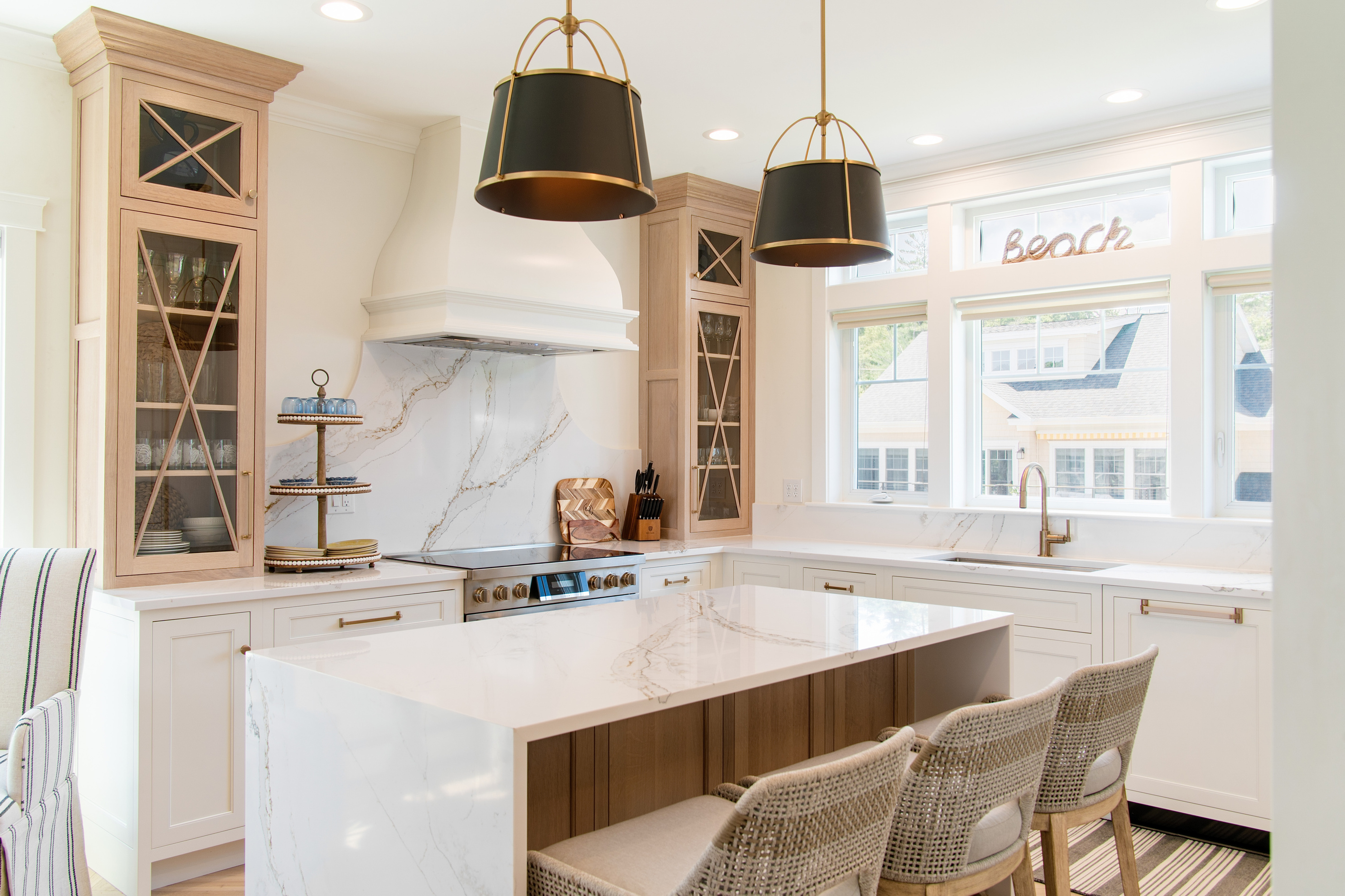 A spacious kitchen island with counter seating makes breakfast, snacks, and casual meals easy.