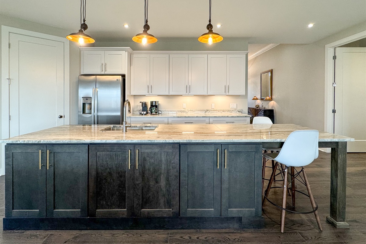 Large island for prepping and relaxing with family and friends.