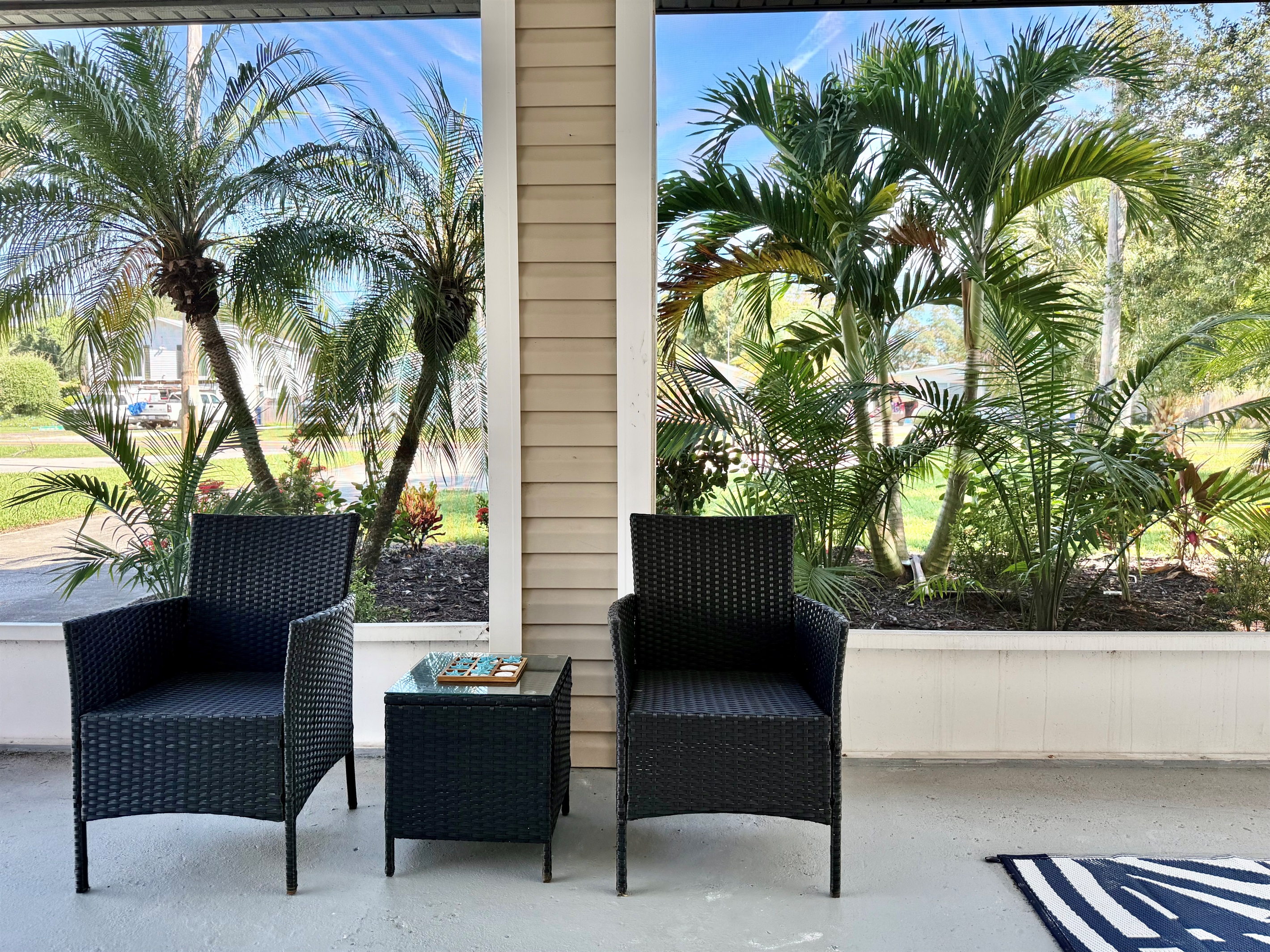Relax here after a day at the beach or pool — a peaceful retreat just steps from the house.