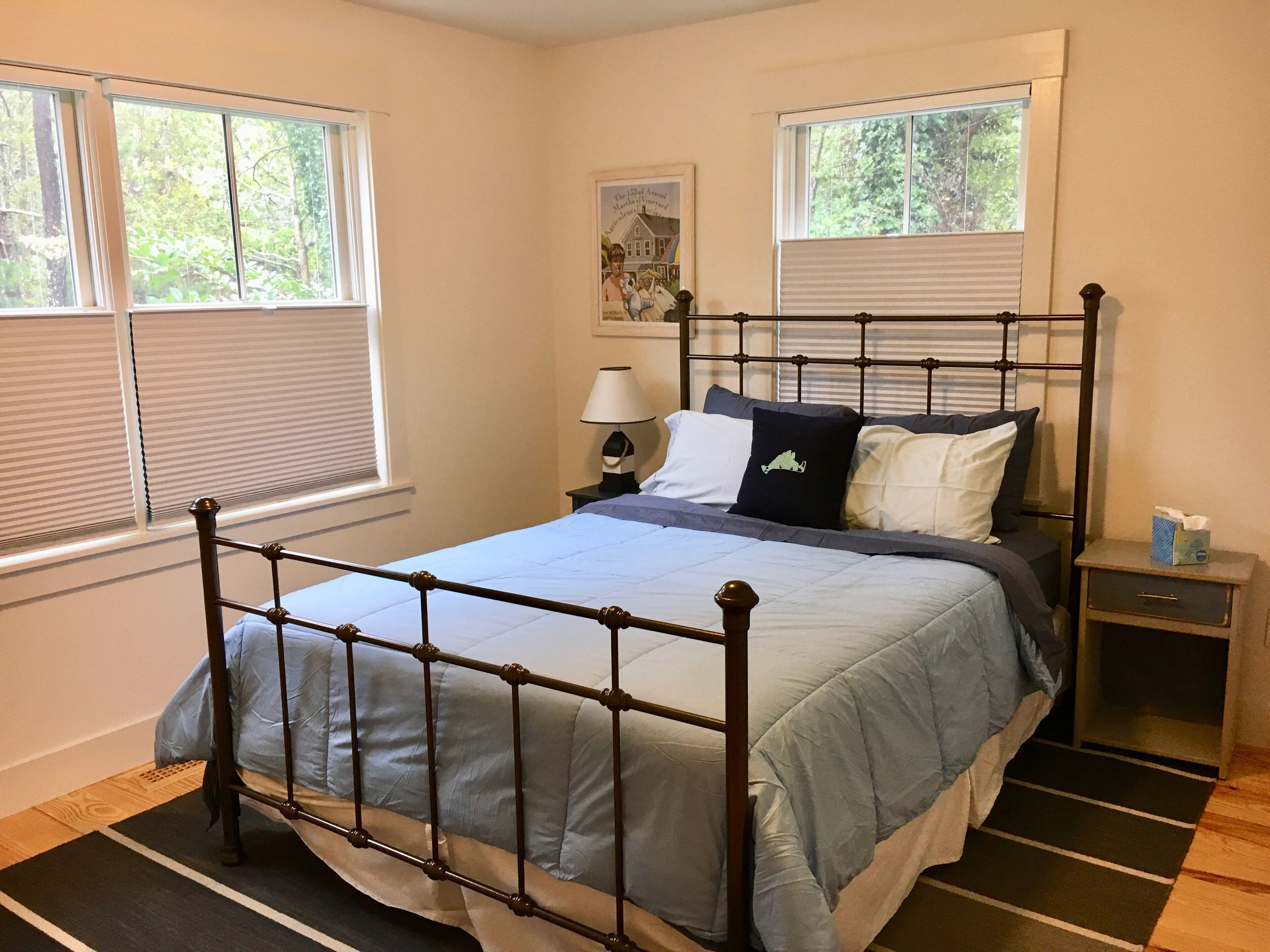 First floor bedroom (off living room). Queen Bed. 
