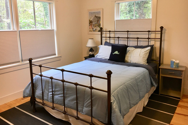 First floor bedroom (off living room). Queen Bed. 