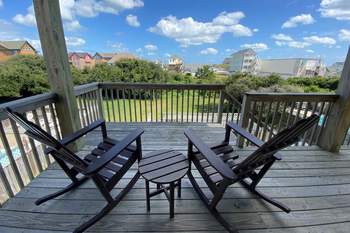 Second-floor deck right outside the Queen bedroom with neighborhood views.