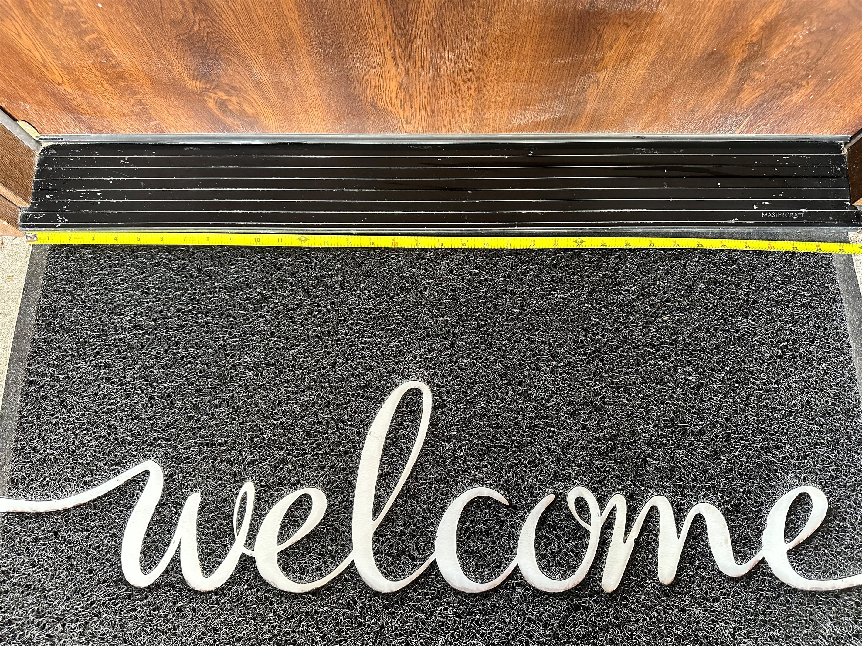 Measurement for the front door that is wider than 32 inches and no steps for accessibility