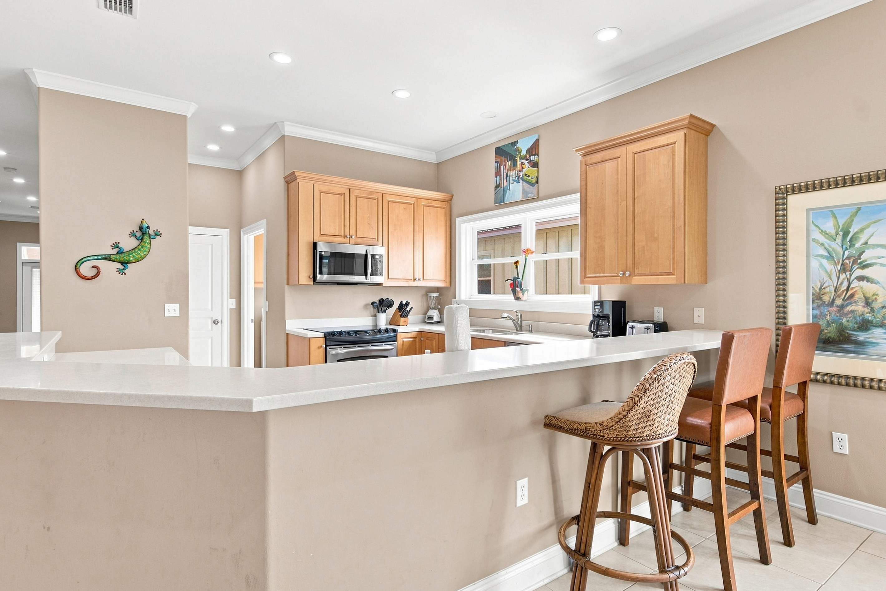 Kitchen island with bar seating, open to the dining area