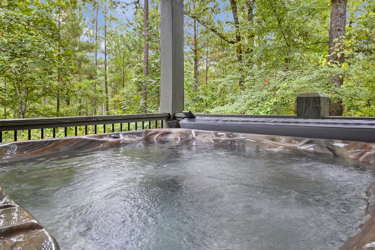 Our hot tub offers a private oasis in the forest, ideal for relaxing under the stars or enjoying a quiet morning.