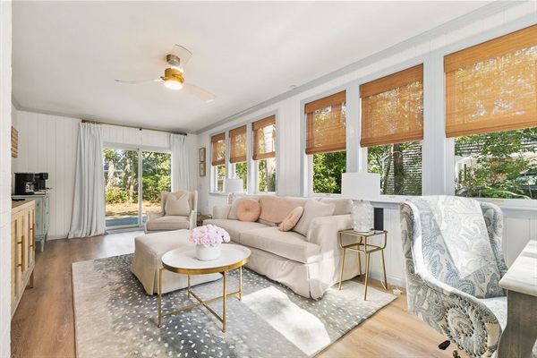 Welcome! Bask in the warmth of our inviting sunroom!