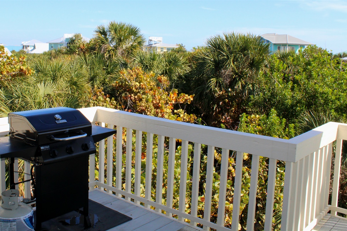 Grill located off the kitchen