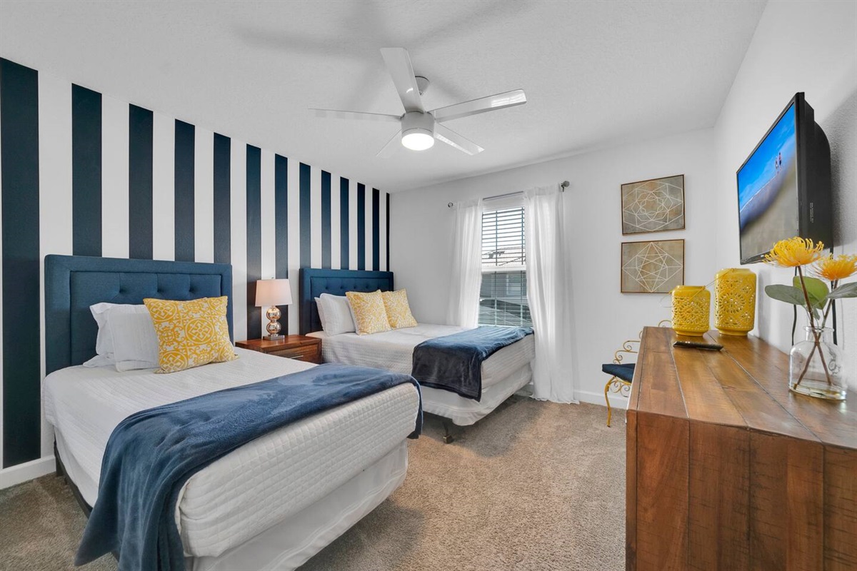 The third bedroom has two beds, one single and one double