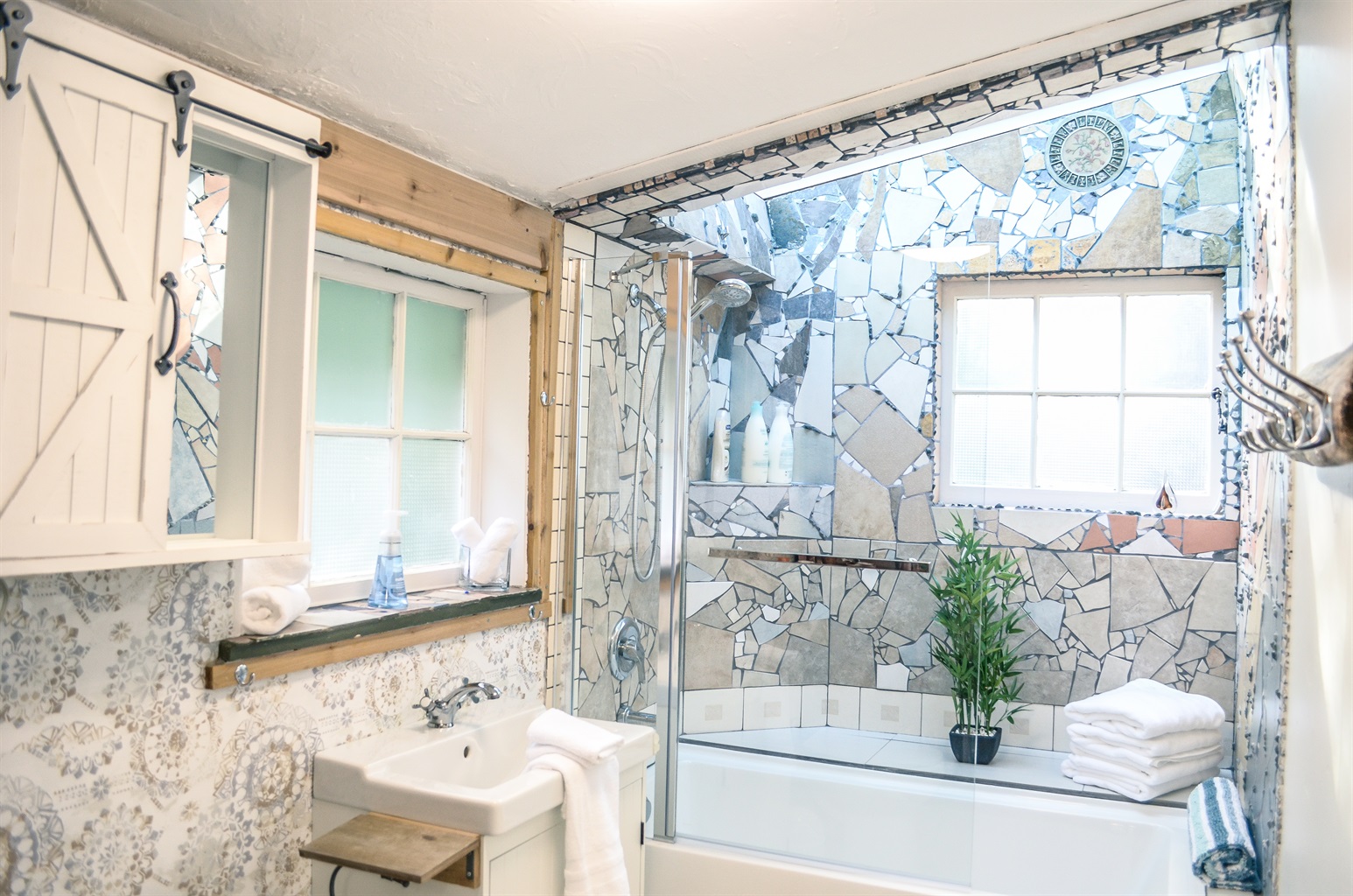 Remodled bathroom with skylight above tub