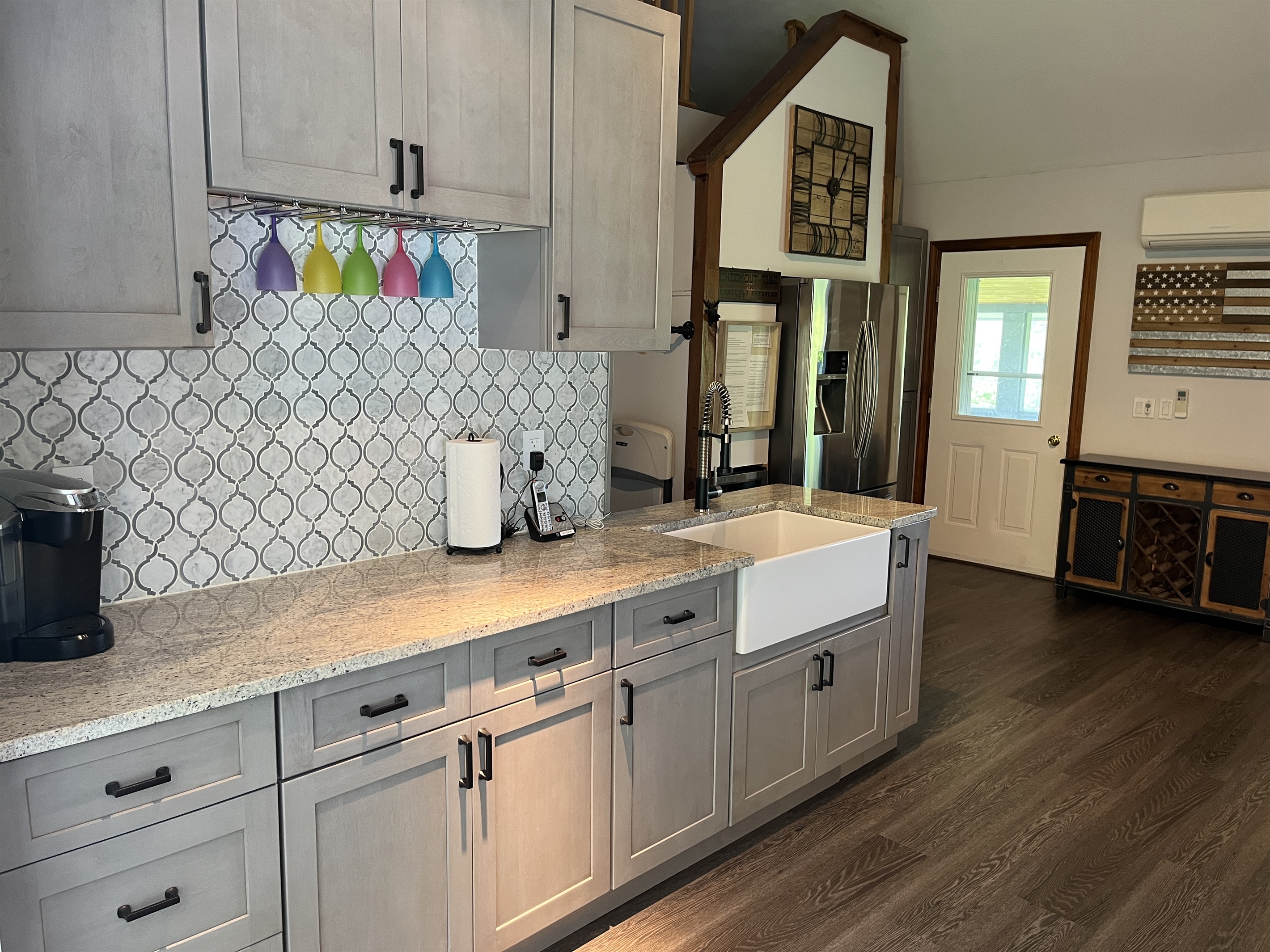 Shagbark Hill fully equipped contemporary kitchen with classic white apron farm sink.