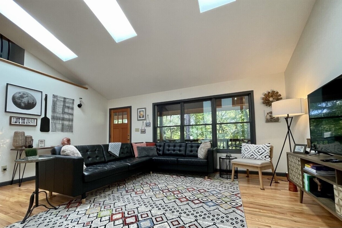 Airy and light, the open living space has plenty of room for all
