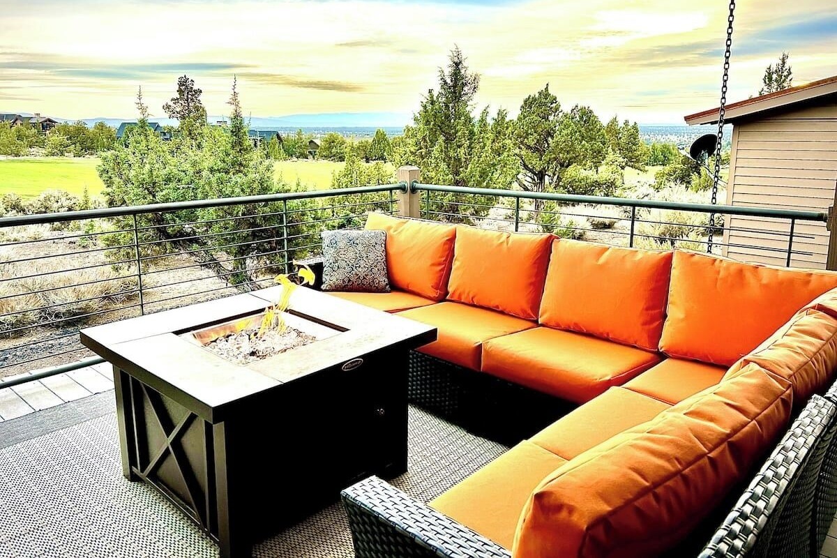 Secluded back deck sitting area with gas firepit