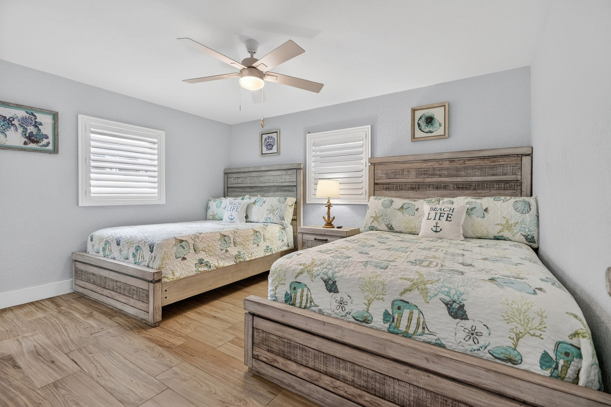Bedroom with beach-themed bedspread