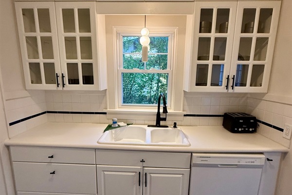 Lots of counter space, 8+ pots and pans set, dishes for 6+ people, spices, cookbooks, and plenty of utensils are all provided.