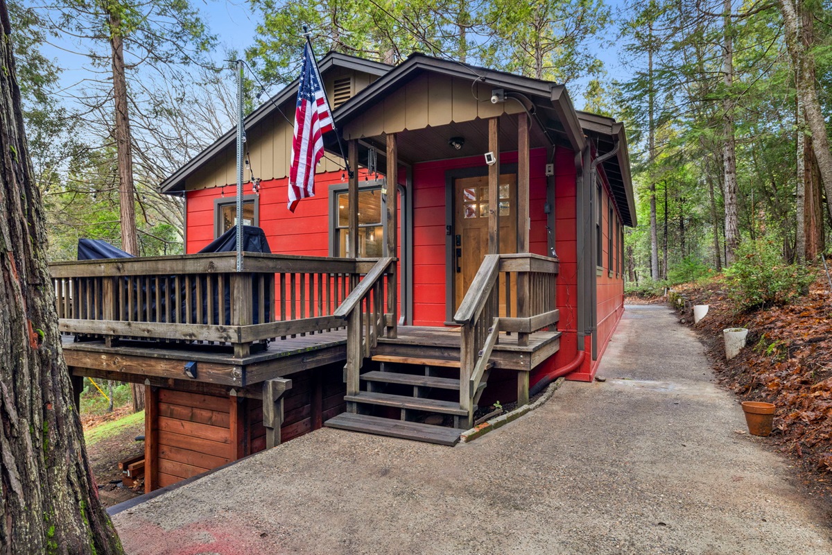 The charming red Lower Cabin.