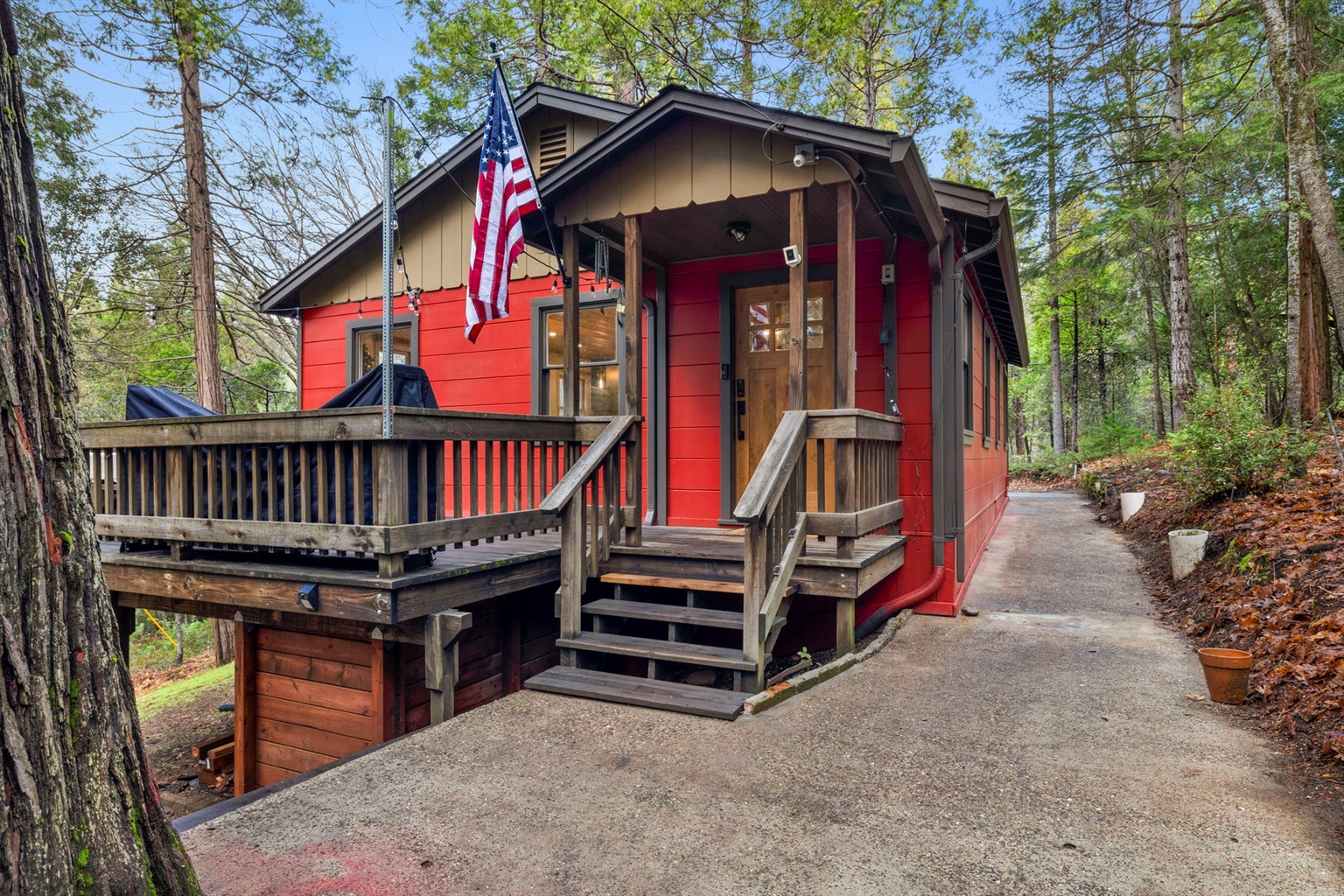 The charming red Lower Cabin.
