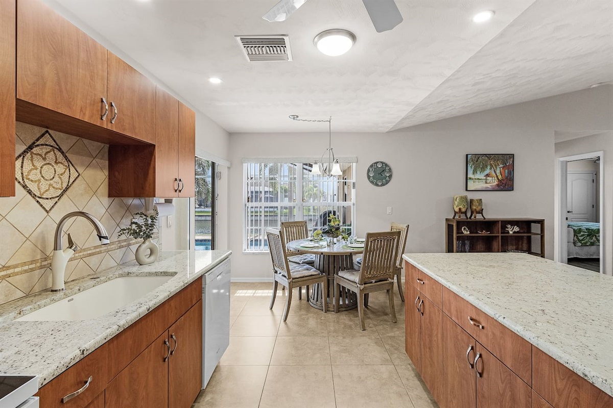 Sunny breakfast nook seating 4, perfect for starting your day with a view!