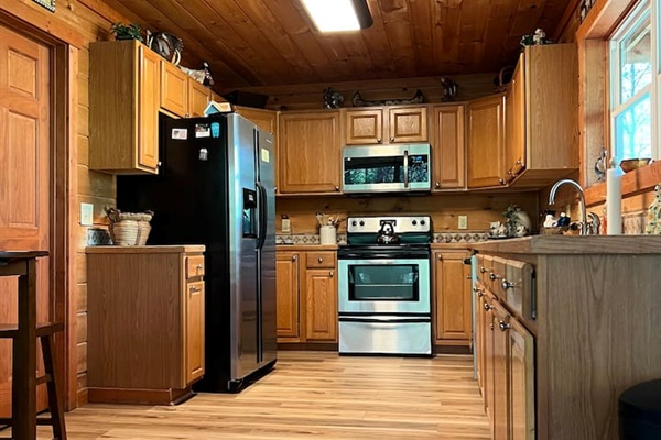 "Spacious Kitchen to Gather, Cook and Create Memories"