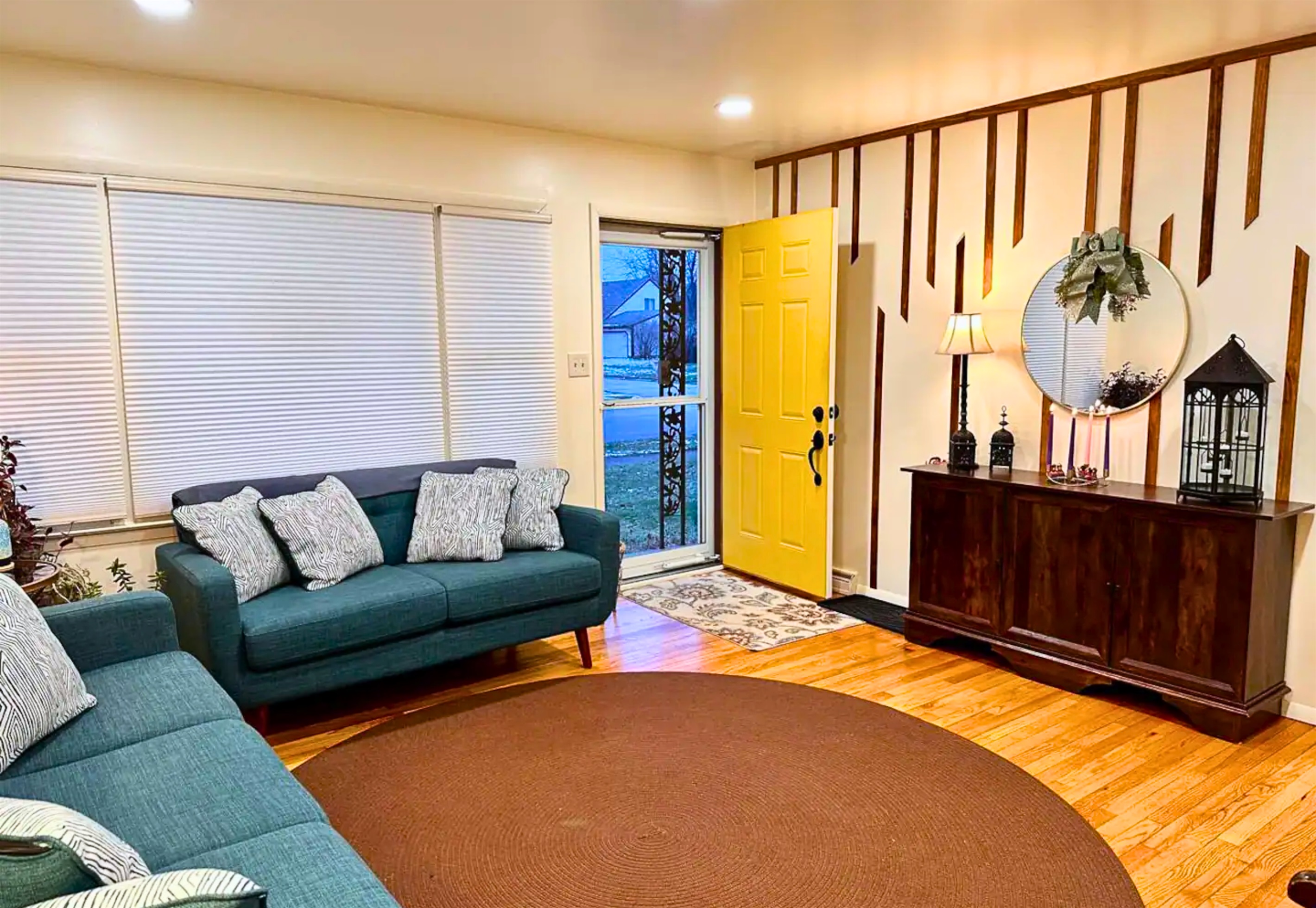 Open and Cozy Living Room with Colorful Accents and Decor