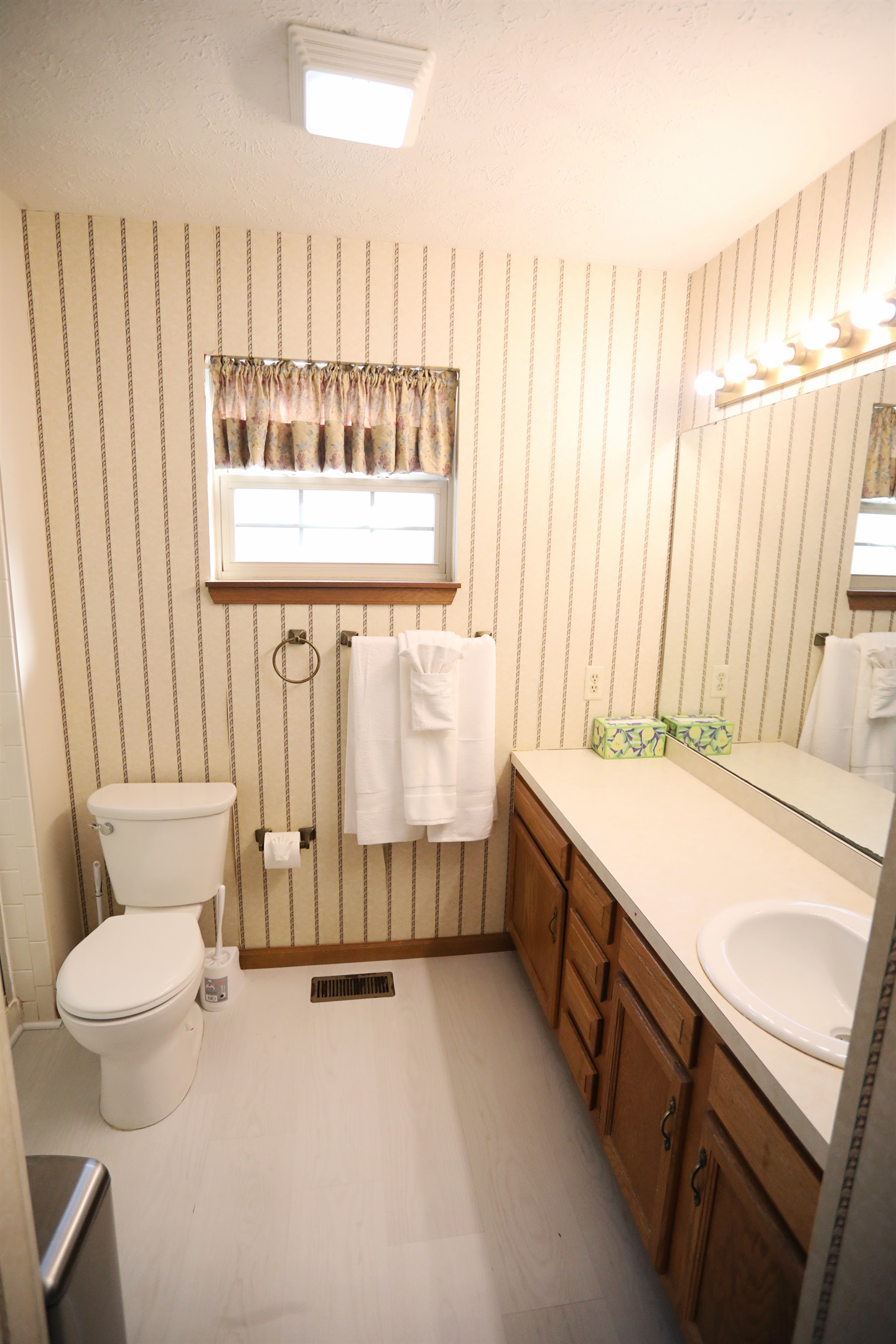 Master Suite full bathroom full bathroom showing toilet, sink, walk-in shower to the left