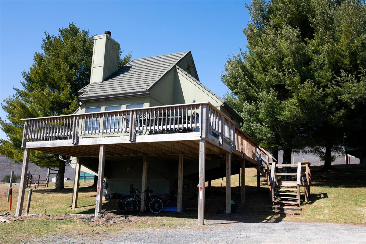 Extended deck with plenty of outdoor dining and seating. Gas grill.