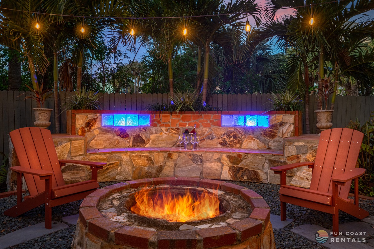 Private and inviting string lit zen Backyard with wood fire pit!