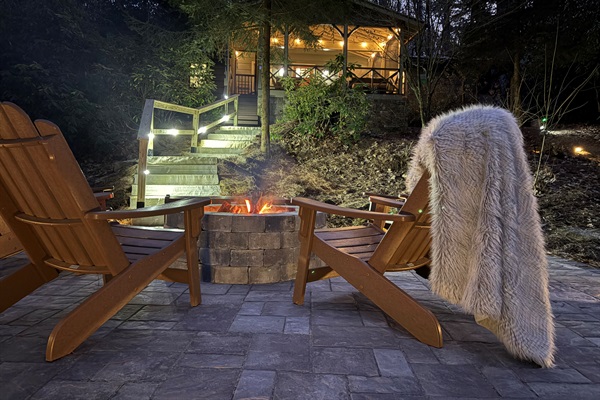 New Outdoor Patio: Mountain nights done right - fireside seating, glowing steps and a cozy cottage waiting above.