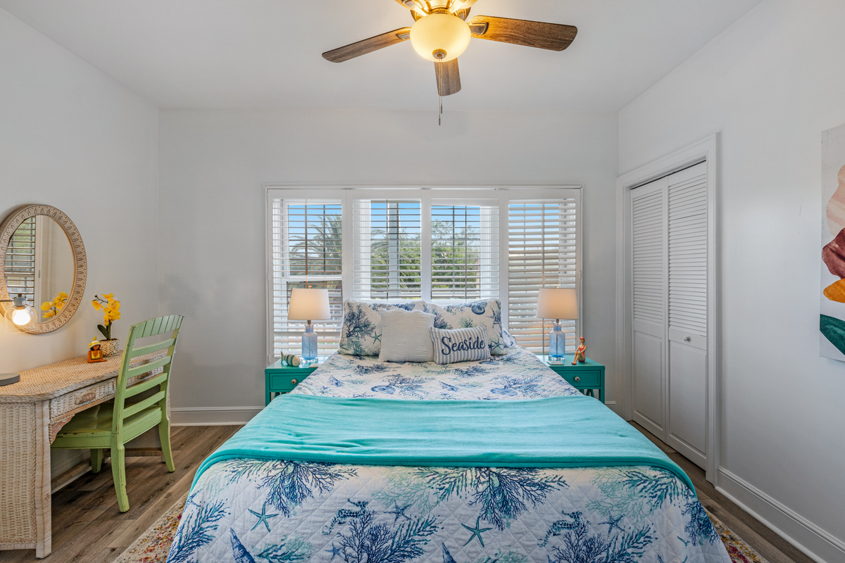 Guest bedroom with desk and queen size Purple brand mattress