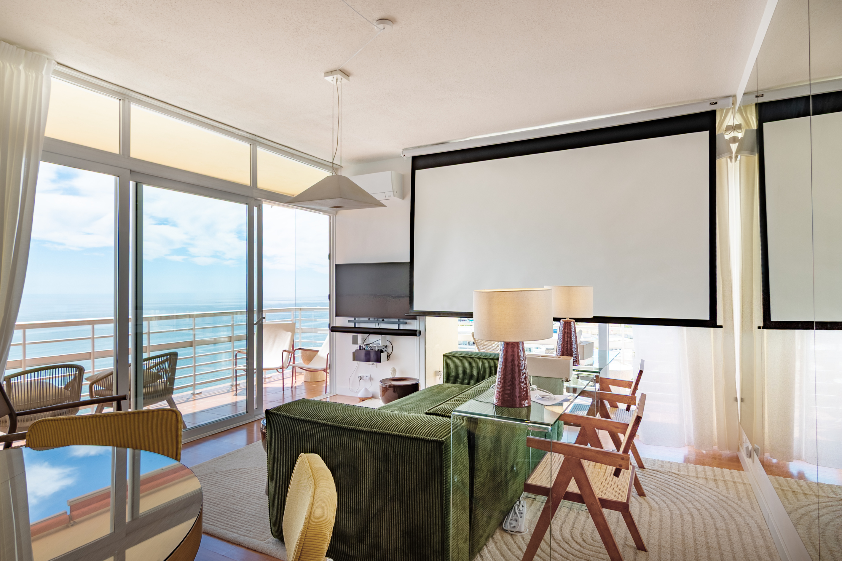 Enjoy movie nights with the private 120-inch home cinema