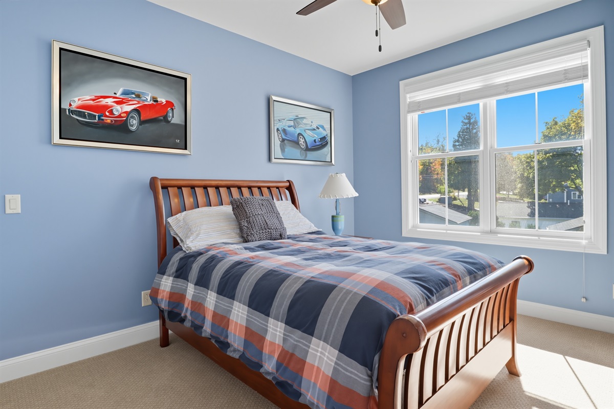 Comfortable second floor full size bedroom with natural light. Bedroom #3