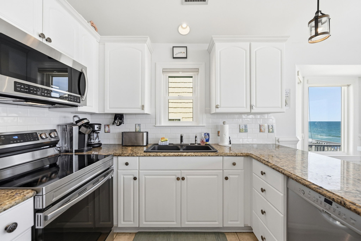 Fully equipped kitchen with ocean views and everything needed to cook and connect
