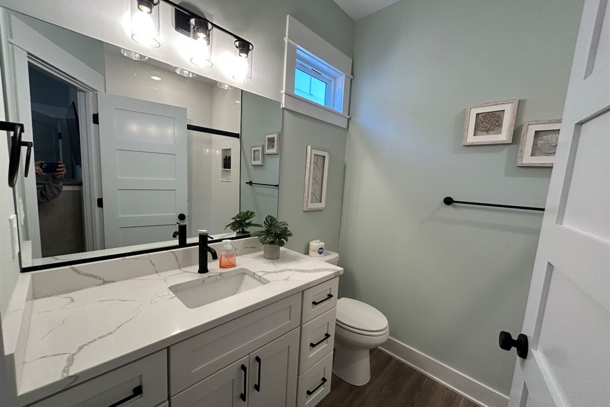 Master bathroom with plenty of cabinet space.