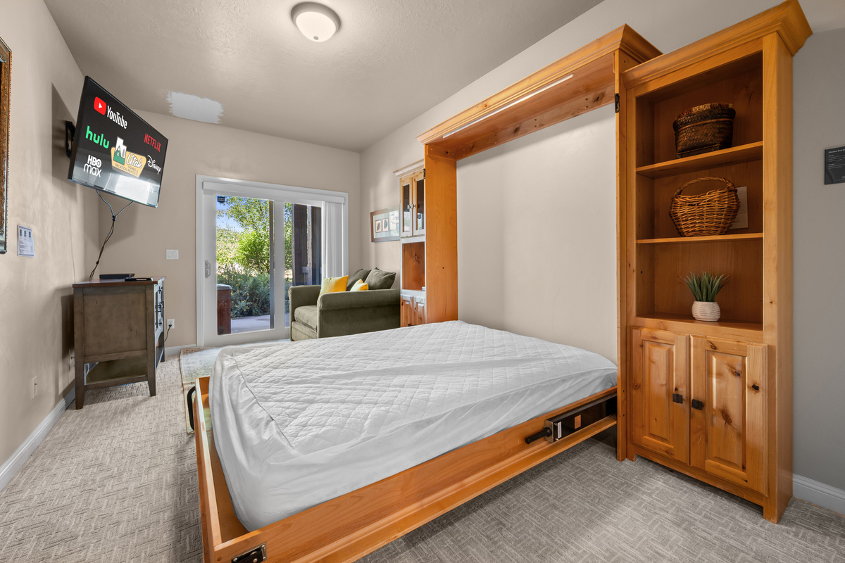 Murphy bed easily converts this room into a comfortable sleeping space or daytime lounge.