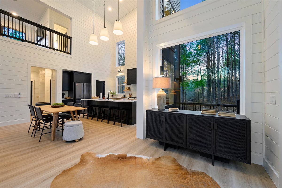 Large picture windows bring the outdoors in, offering peaceful woodland views while you cook.