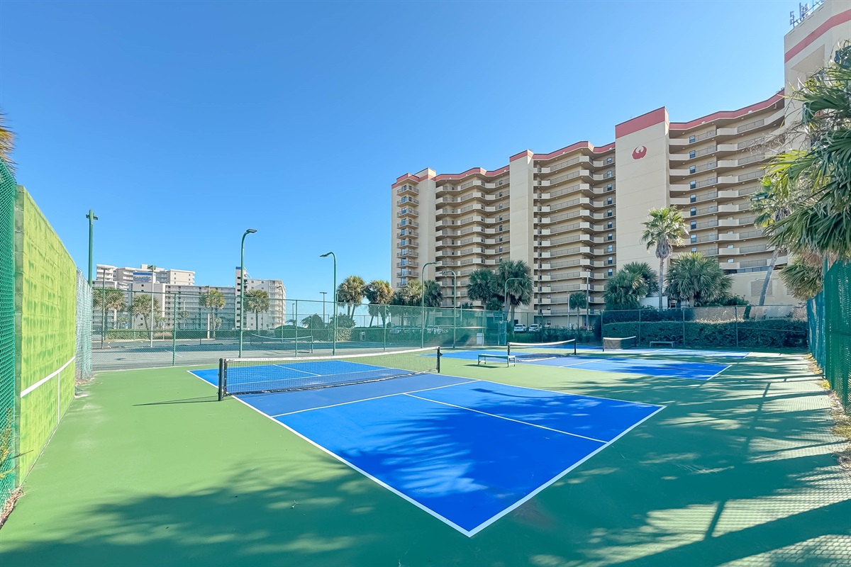 Guests have access to this well-maintained tennis court, nestled among the palm trees and resort buildings. Enjoy a great workout and the sunny coastal atmosphere right here on the property.