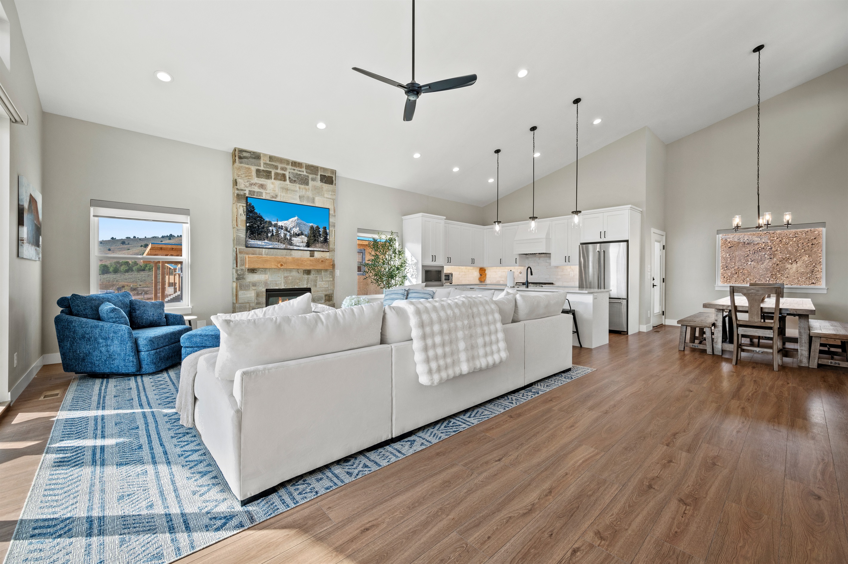 High ceilings, modern lighting, and open-concept design create a bright, airy gathering space.