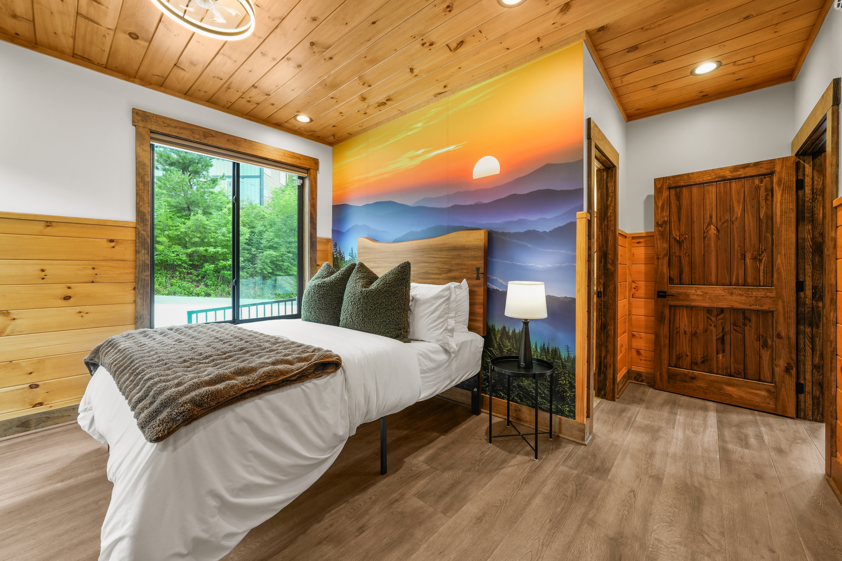 Queen Bed Suite with en-suite bathroom with bathtub / shower located conveniently on the main level.