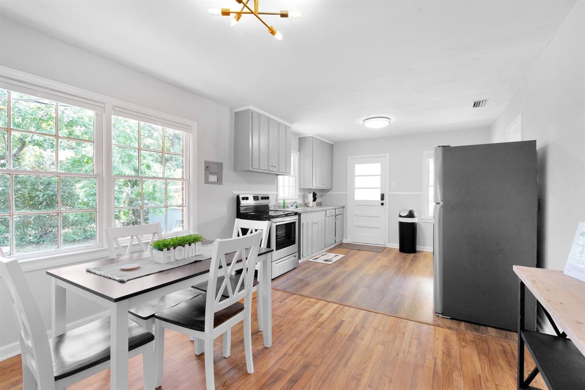 The kitchen and dinning area are great spaces to create a quick home meal, spread out and play games or just sit and enjoy your morning coffee. 
