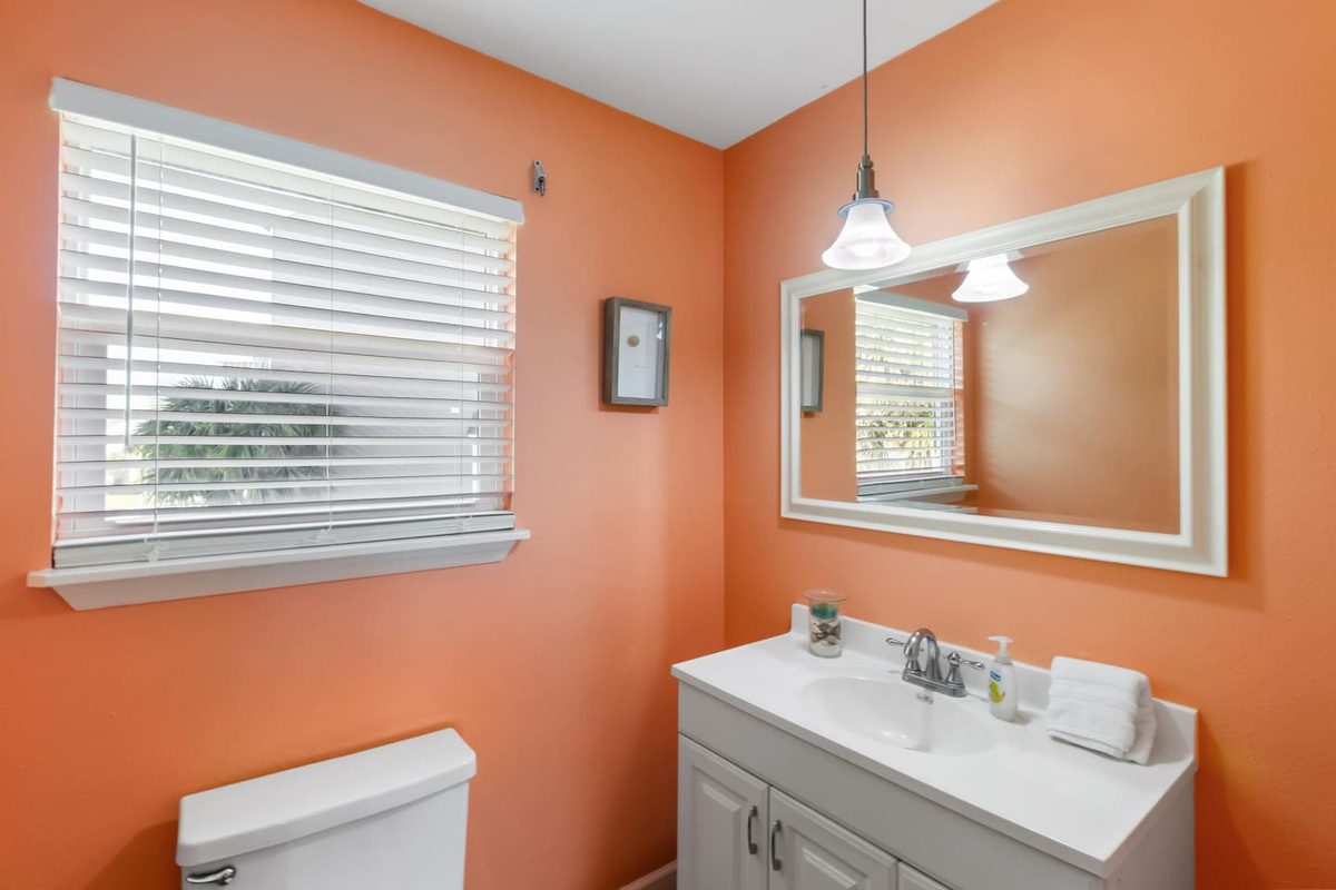 Run to the main level half bath without disturbing anyone upstairs &mdash; it's small, convenient, and right where you need it.
