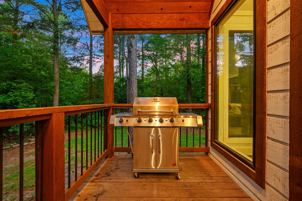 Outdoor Patio: Sizzle up some fun on the grill while enjoying serene forest views!