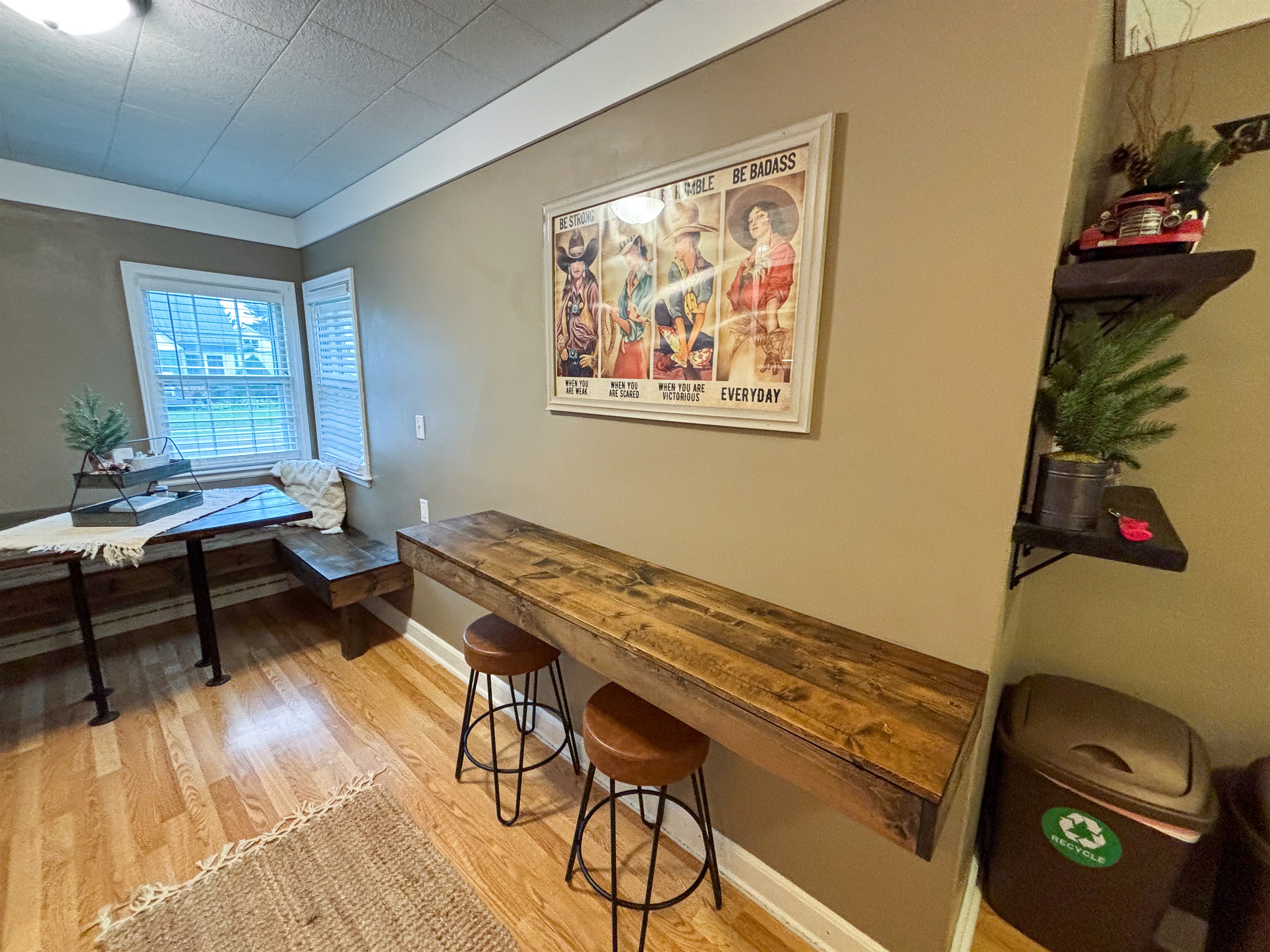 Modern and efficient—everything you need to create a delicious meal. The kitchen features a stainless steel refrigerator, stove, coffee maker, kitchenette oven, kettle, and blender