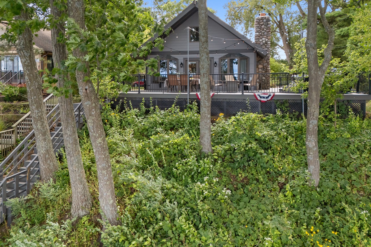 From the deck, enjoy your privacy while still taking in the lake views and water activities below.